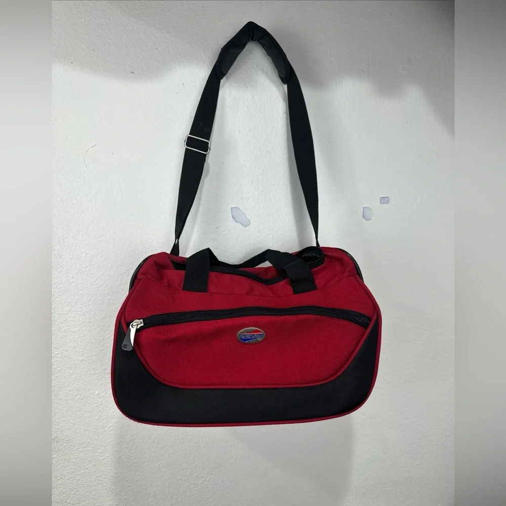 American Tourister Red and Black Duffel Bag